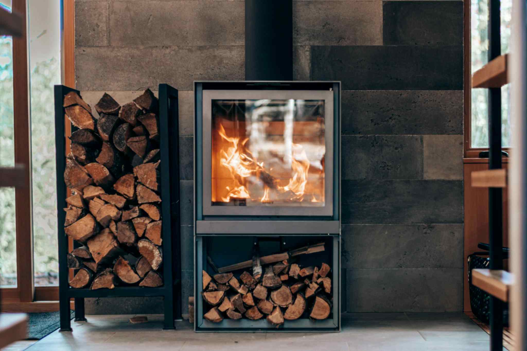 Creative fireplace with fuel woods in modern house